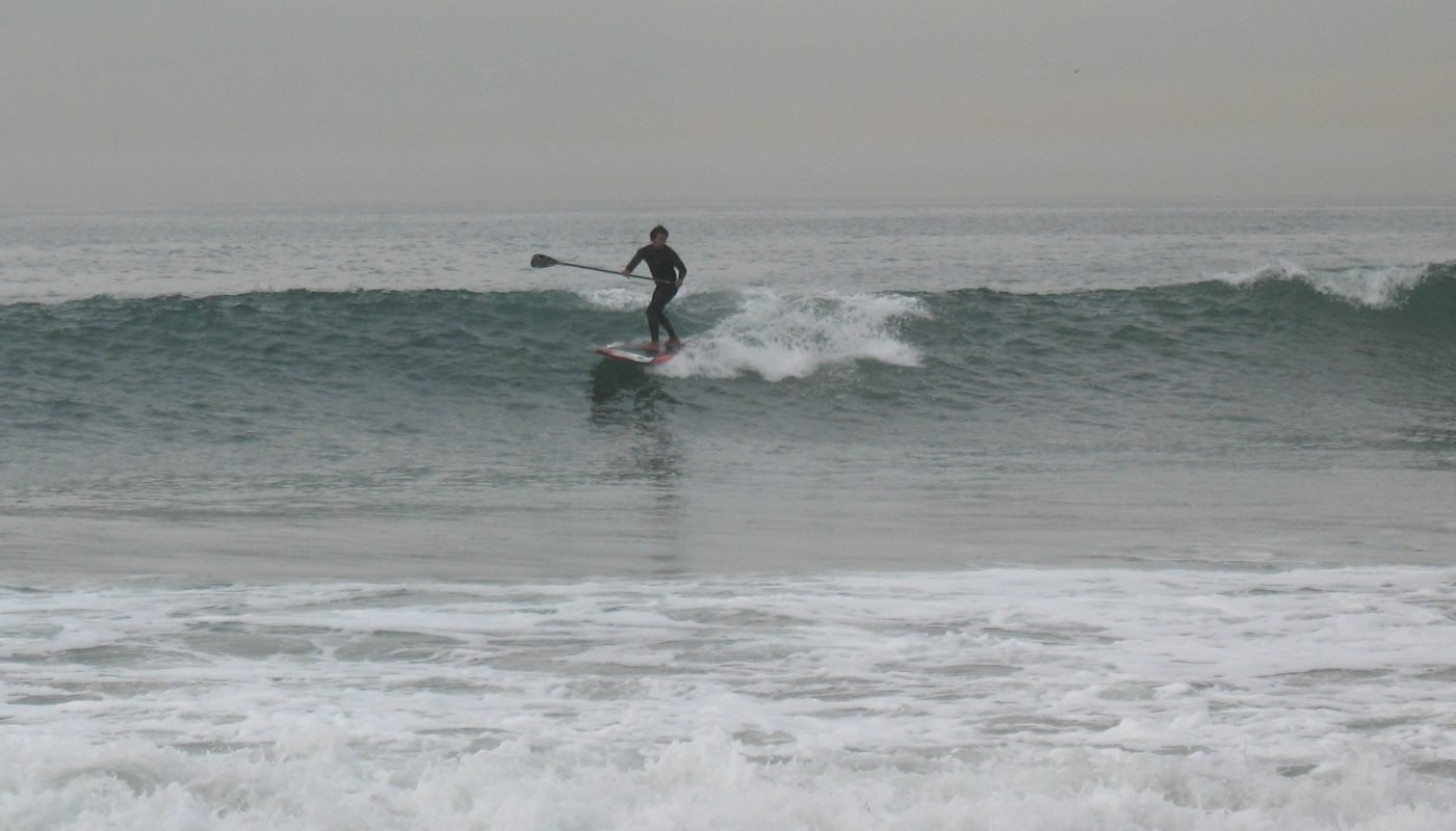 Paddle boarding i n Venice surf