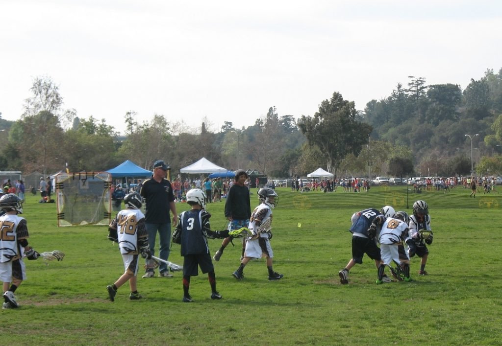 Bpoys playing Lacrosse at Rose Bowl