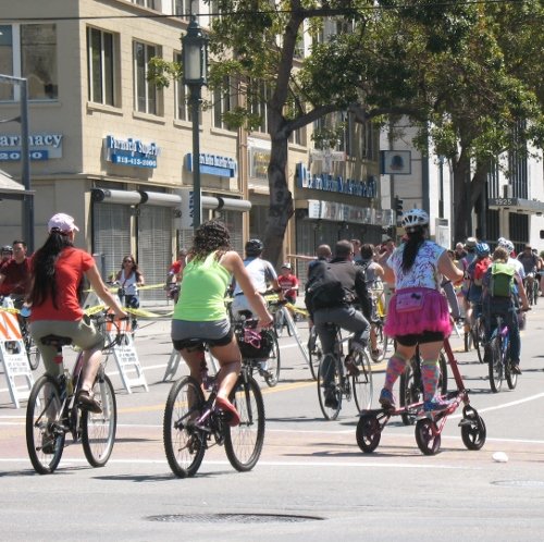 It’s CicLAvia — bicycling along Wilshire Blvd. in Los Angeles.  No cars!  Just people and #bikes!