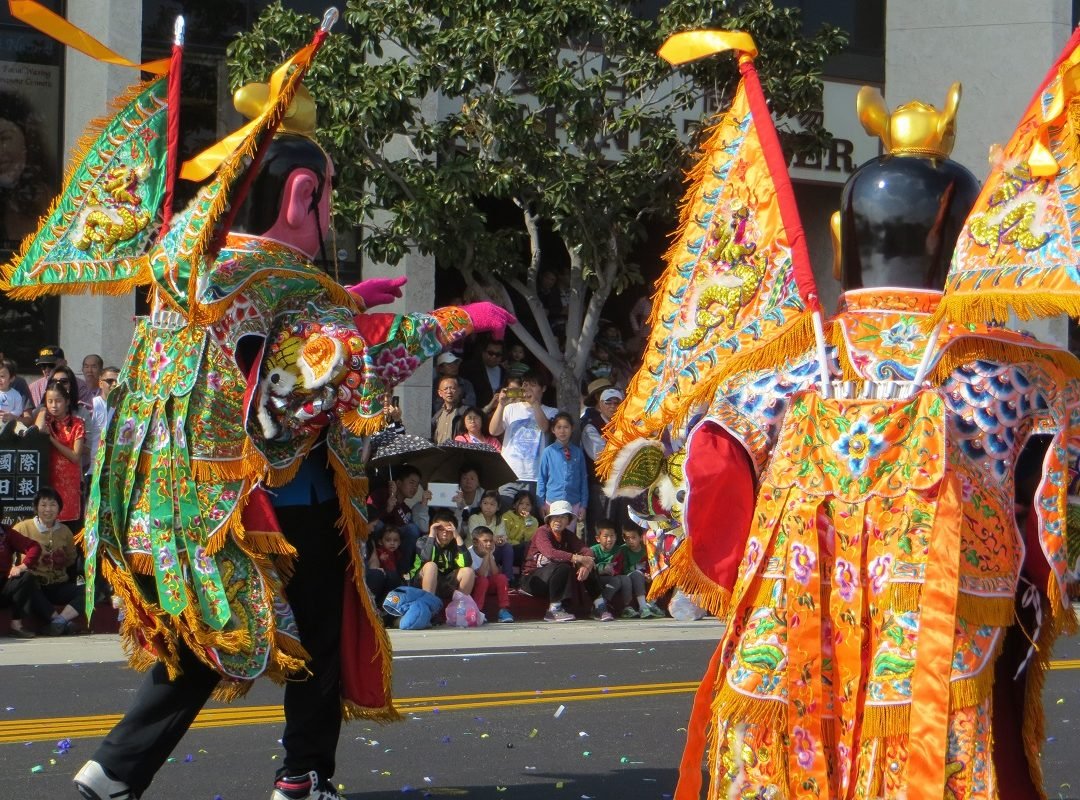 huge Chinese figures in Chinatown New Year's parade 2015