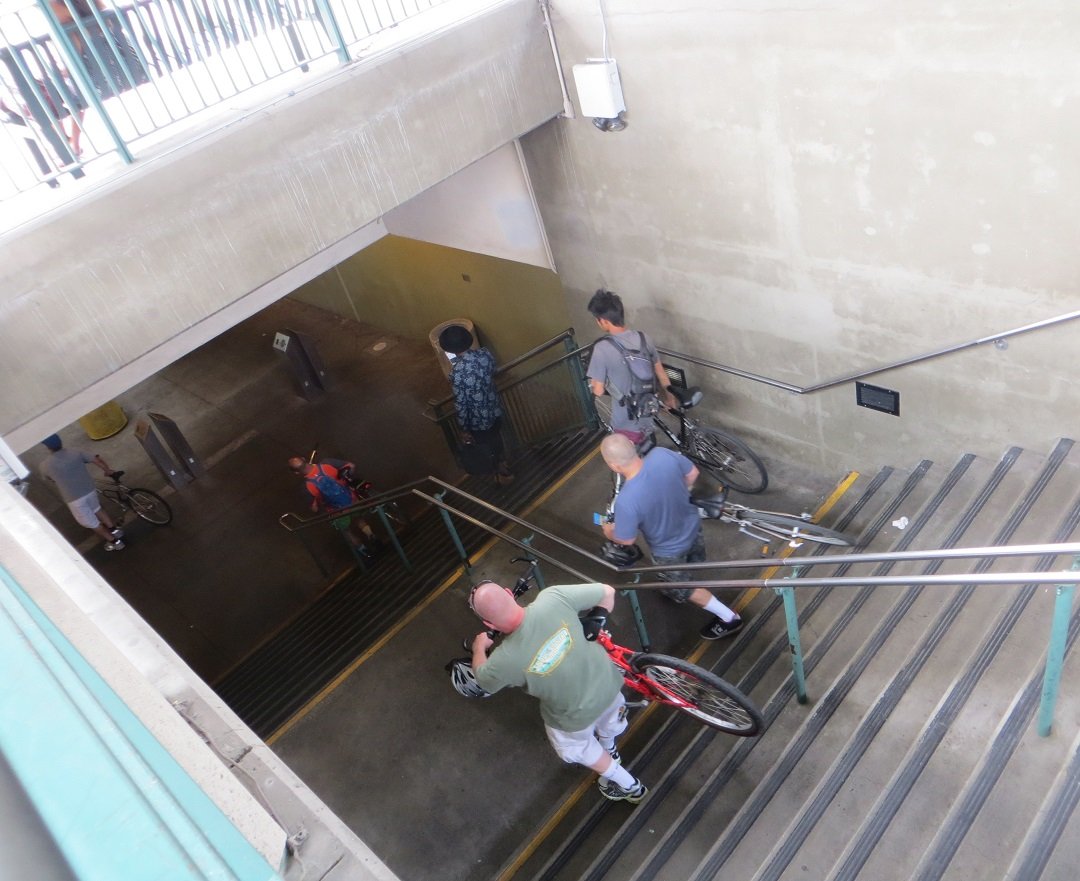 Bicyclists descending into Metro on way to Culver City