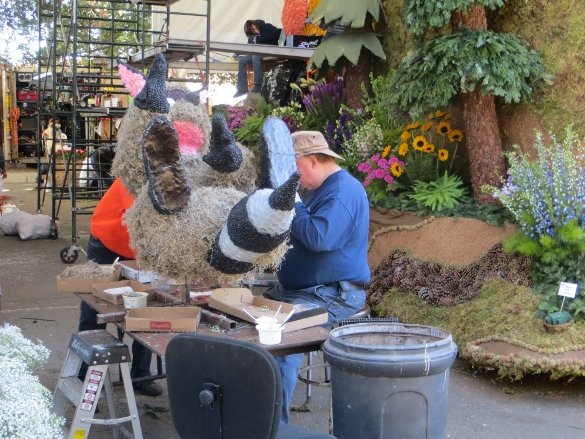 decorating a racoon South Pasadena float