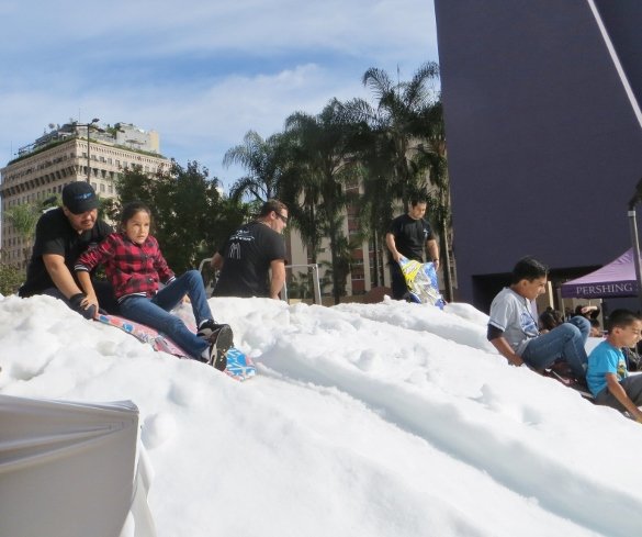 Never snows in downtown L.A. but they made some for these sled runs. 