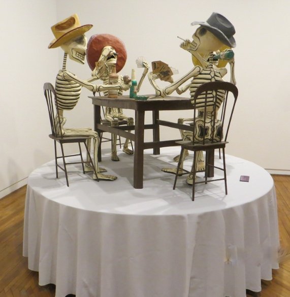 Skeleton sculpture card players