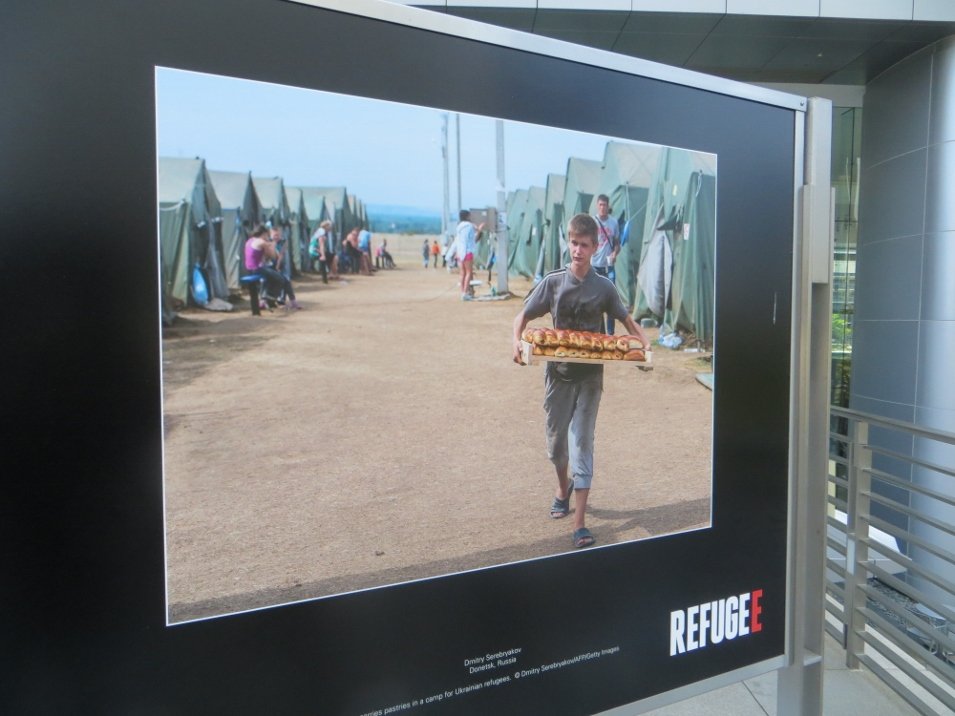 refugee boy with bread