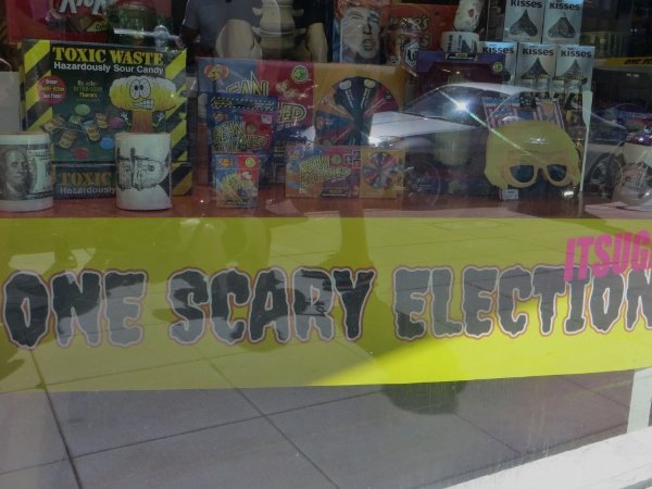 See the Green witch Hillary and Pumpkinhead Donald in a candy store window in Pasadena