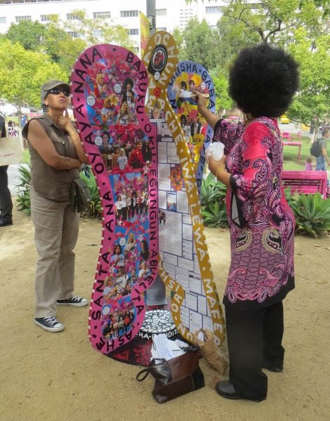 artist painting pink angel