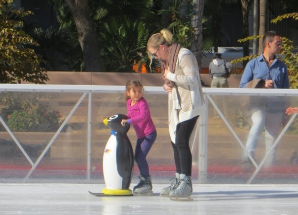 Ice skating at Pershing Square under the palm trees